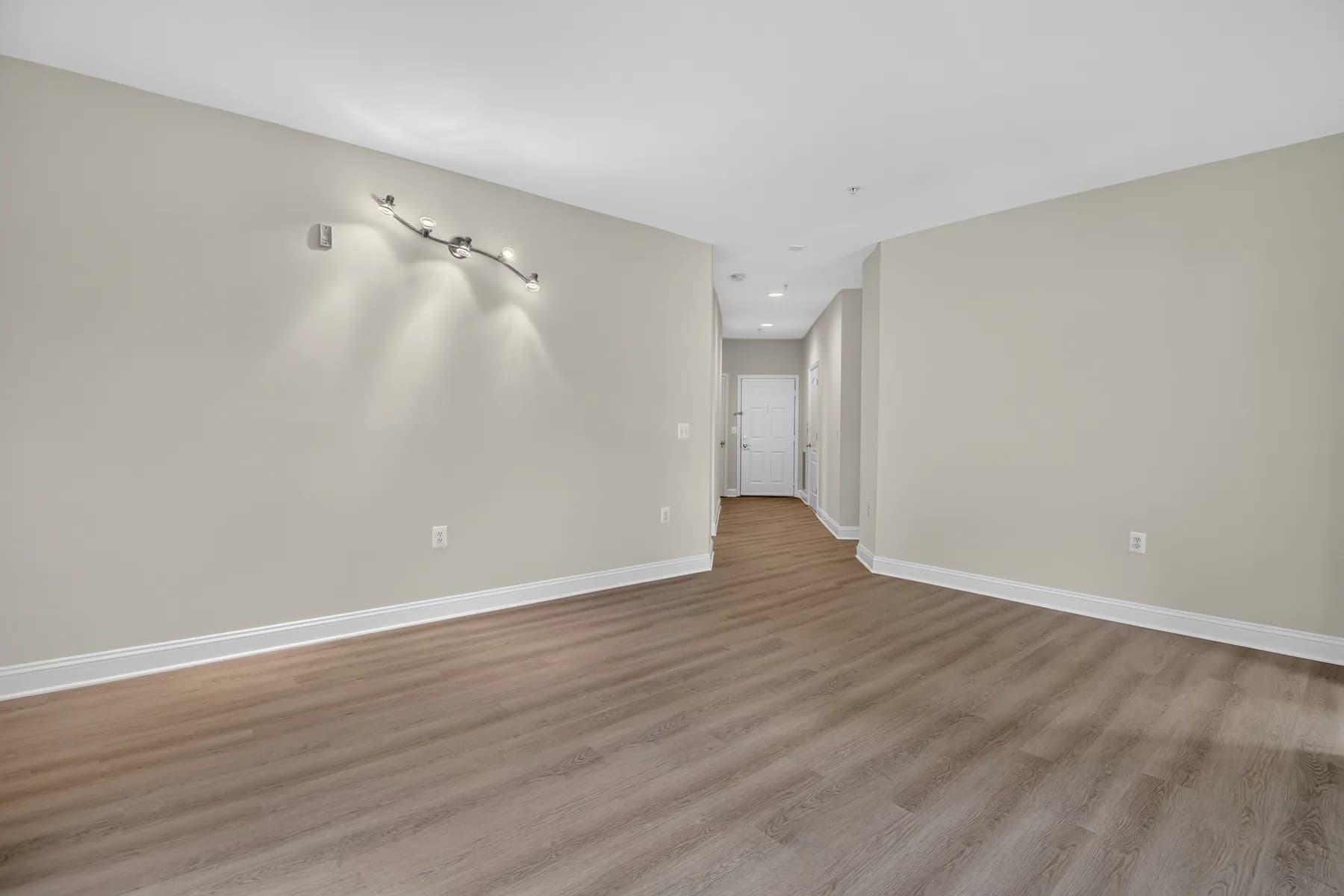 An empty living room before virtual staging