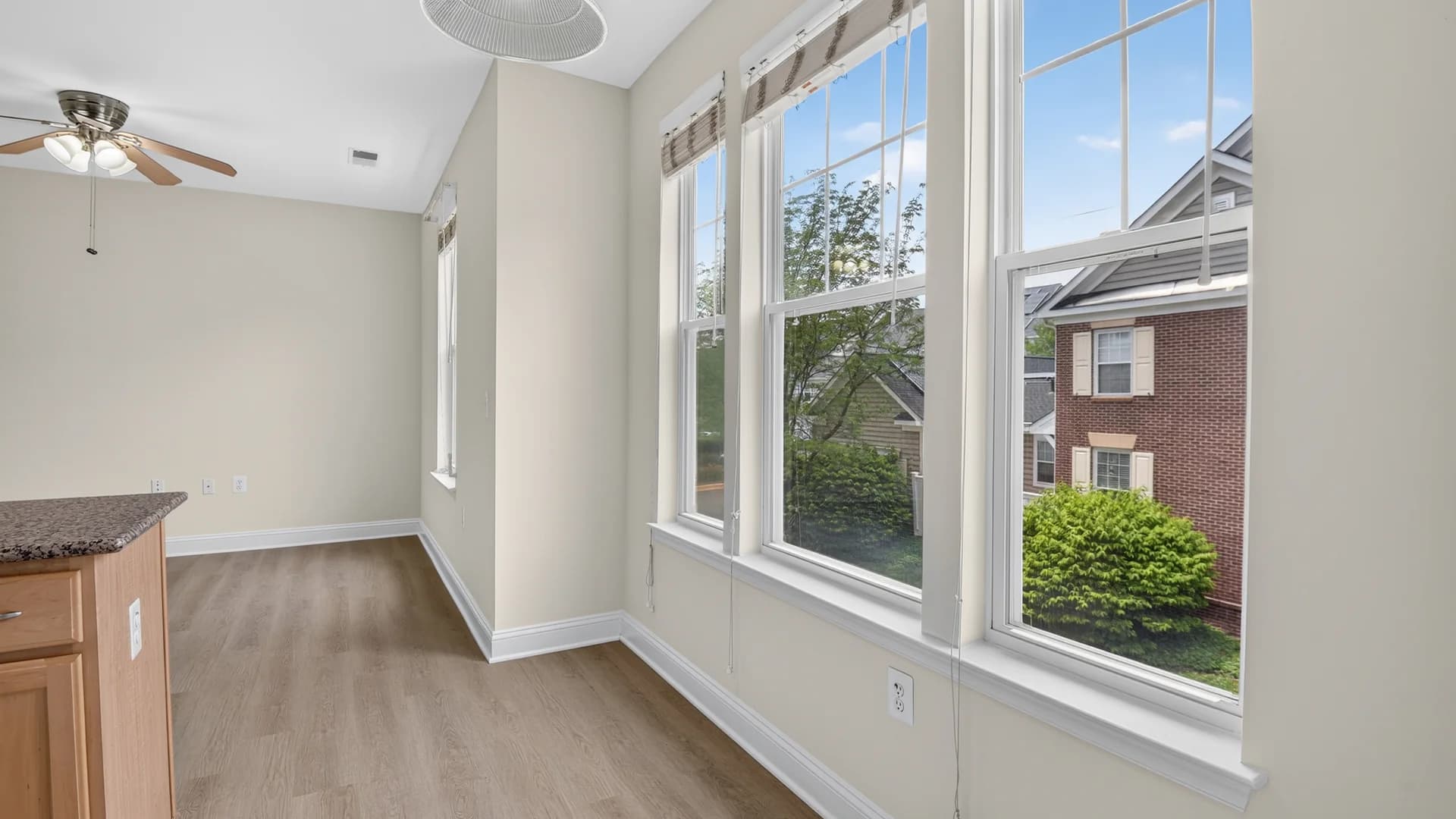 An empty room before virtual staging — bare floor and walls